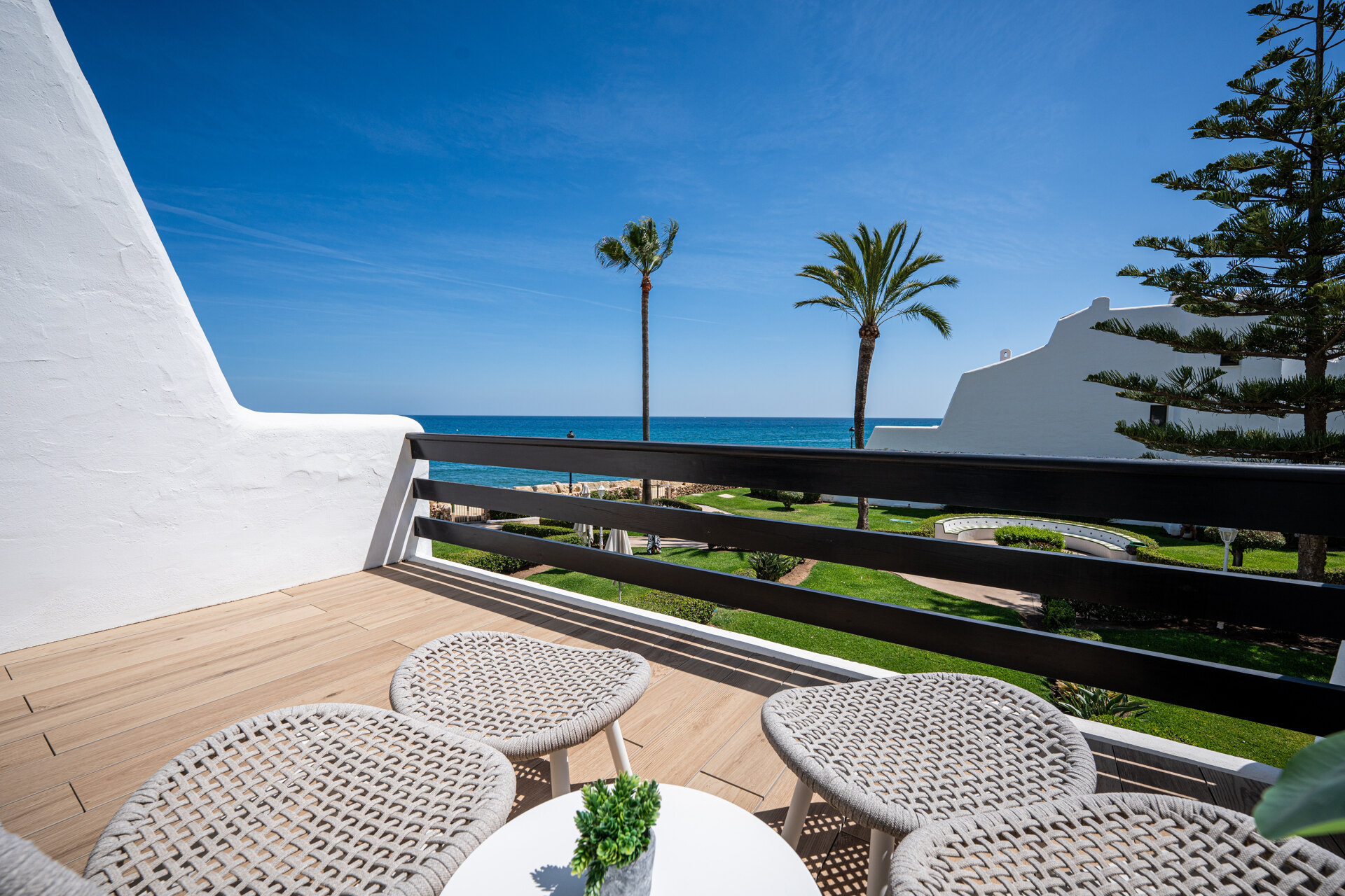 Exceptional beachfront townhouse offers the ultimate coastal lifestyle with uninterrupted sea views