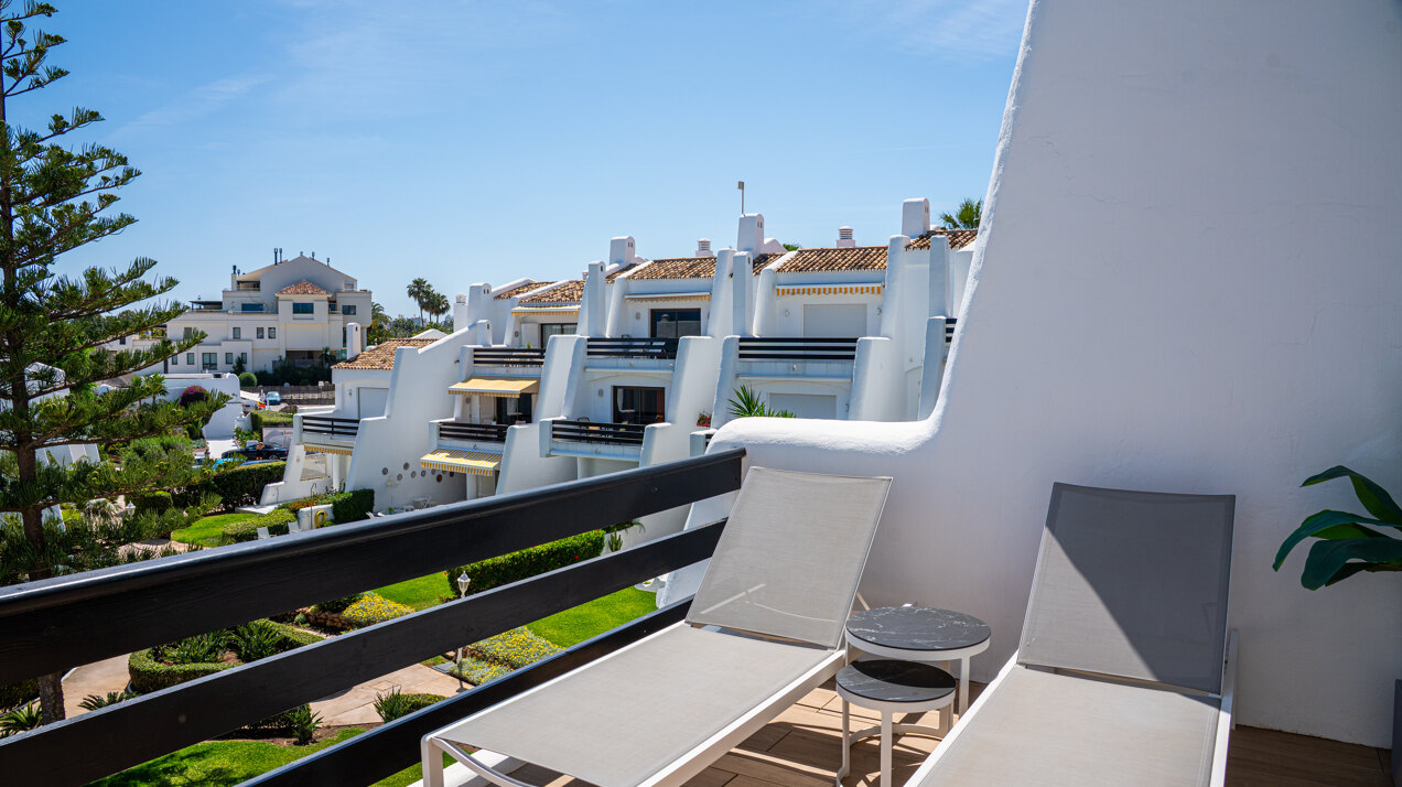 Exceptional beachfront townhouse offers the ultimate coastal lifestyle with uninterrupted sea views