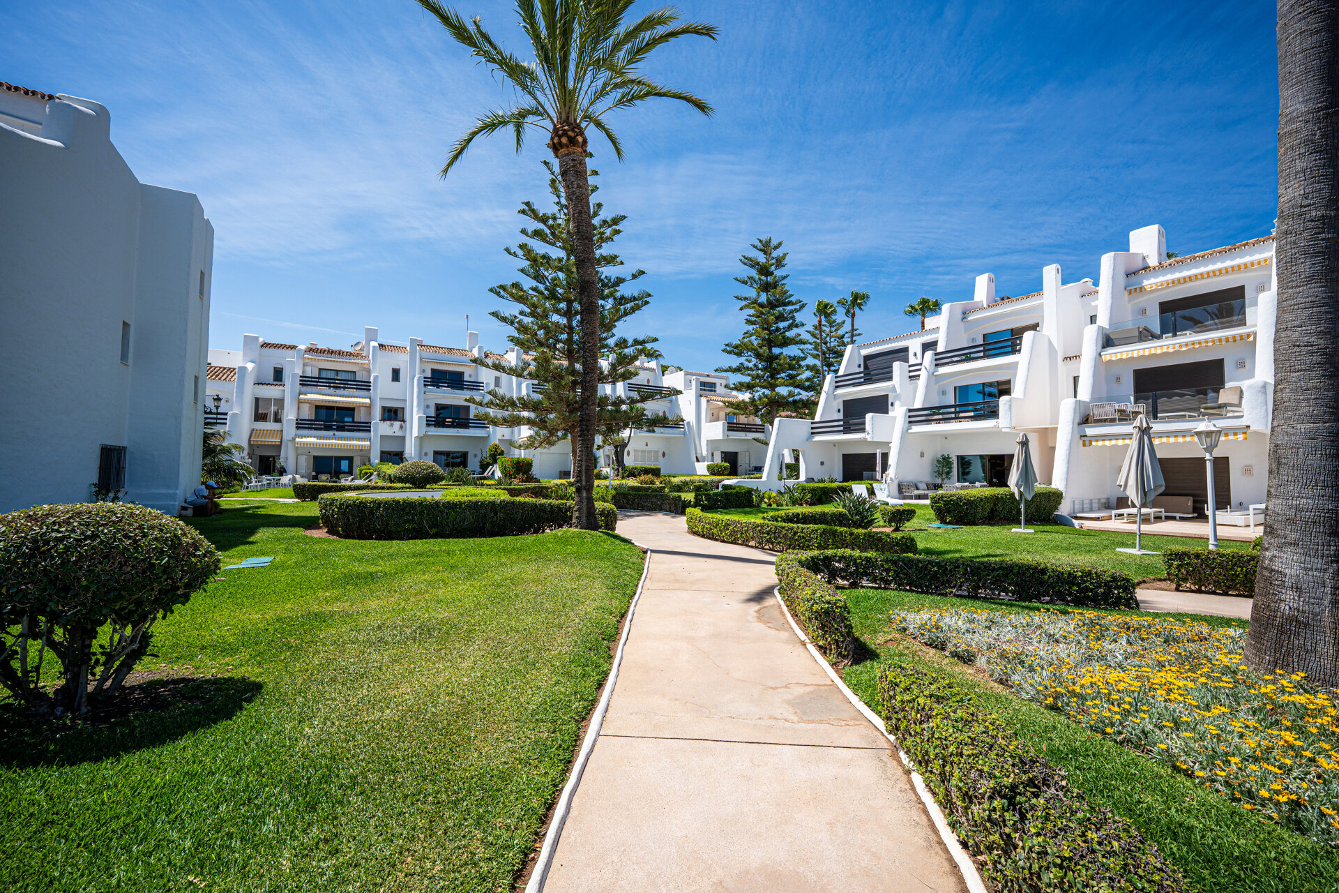 Exceptional beachfront townhouse offers the ultimate coastal lifestyle with uninterrupted sea views