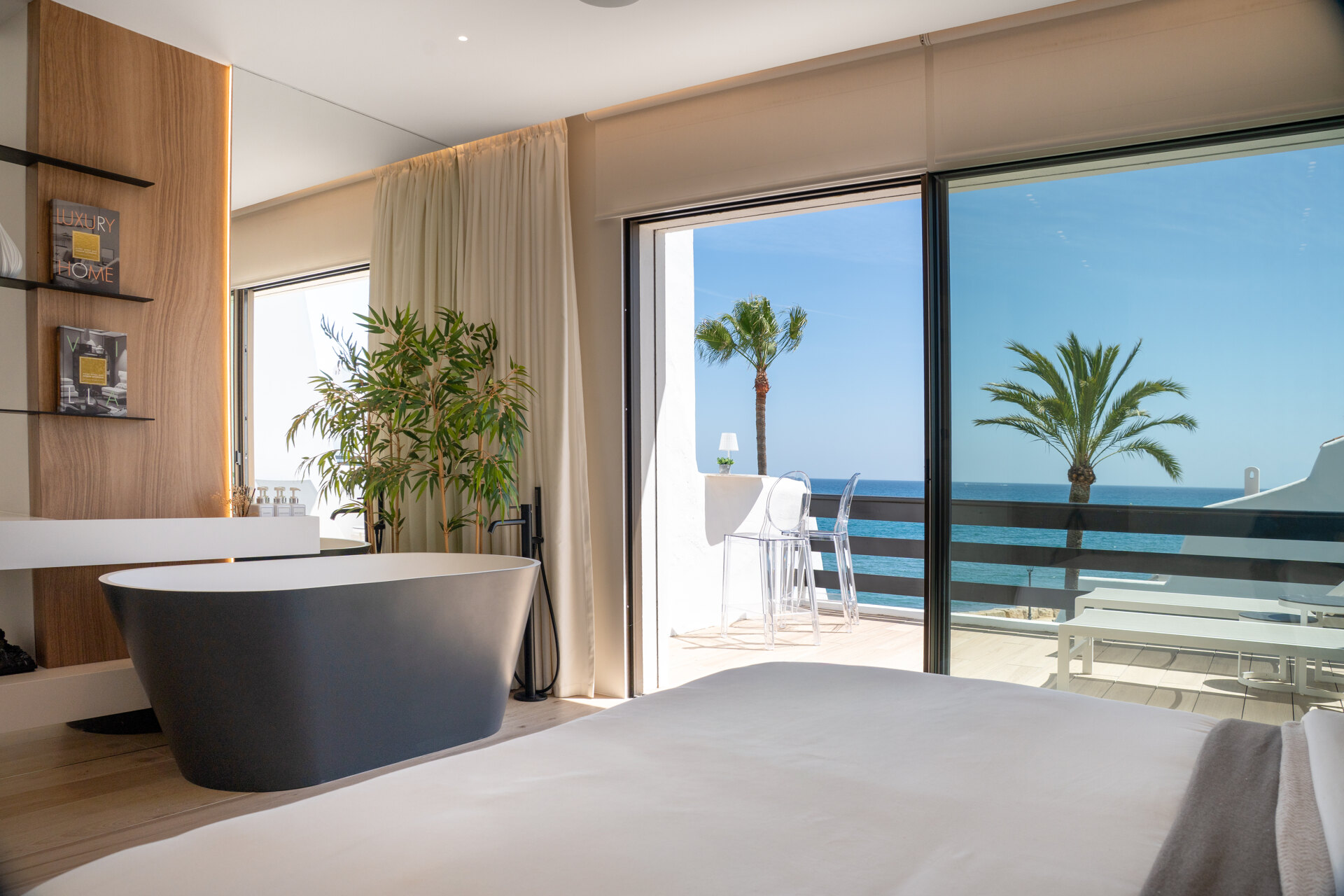 Exceptional beachfront townhouse offers the ultimate coastal lifestyle with uninterrupted sea views