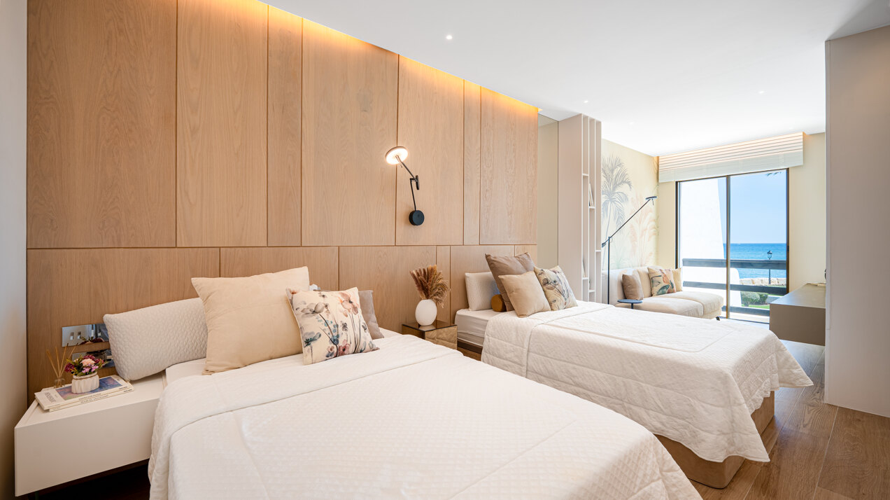Exceptional beachfront townhouse offers the ultimate coastal lifestyle with uninterrupted sea views