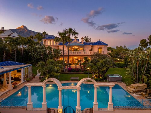 Property Highlights- Prime Nueva Andalucía- Walking to Puerto Banús- 3,400 m² Plot- 1,727 m² Built- Six En-Suite Bedrooms- Panoramic Sea Views- Private Tennis Court- Indoor & Outdoor Pools- Wellness Spa & Gym- Garage for Nine Cars