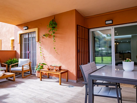 Recently renovated ground floor apartment with private garden in La Reserva de Marbella, front line golf, terrace, and communal pool.