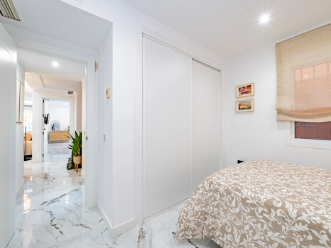Recently renovated ground floor apartment with private garden in La Reserva de Marbella, front line golf, terrace, and communal pool.