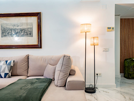 Recently renovated ground floor apartment with private garden in La Reserva de Marbella, front line golf, terrace, and communal pool.