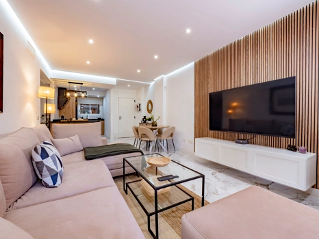 Recently renovated ground floor apartment with private garden in La Reserva de Marbella, front line golf, terrace, and communal pool.