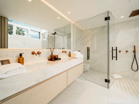 Modern Coastal-Inspired Duplex Penthouse in Gated Community
