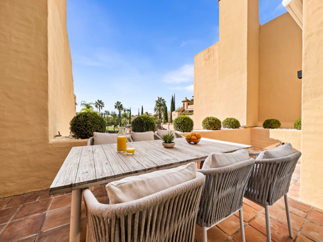 Modern Coastal-Inspired Duplex Penthouse in Gated Community
