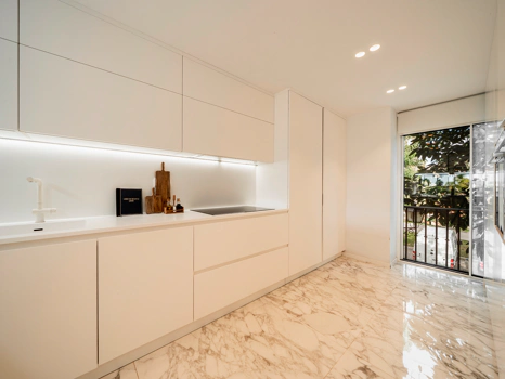 Modern Coastal-Inspired Duplex Penthouse in Gated Community