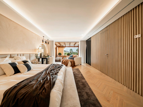 Modern Coastal-Inspired Duplex Penthouse in Gated Community