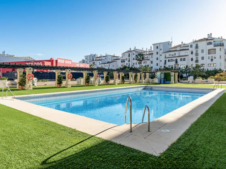 Frontline Beach Modern 2-Bedroom Apartment in Puerto Banús with Terrace & Luxury Amenities