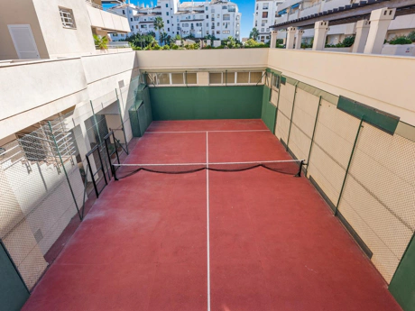 Frontline Beach Modern 2-Bedroom Apartment in Puerto Banús with Terrace & Luxury Amenities