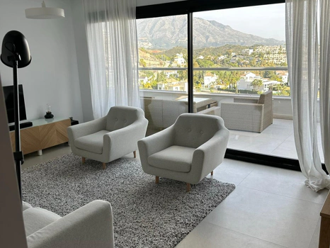 Located in the exclusive development of The Crest, this stylish 3-bedroom apartment offers a refined blend of modern design, comfort, and natural light—ideal for those seeking a spacious home on the Costa del Sol.  The open-plan living and dining area is