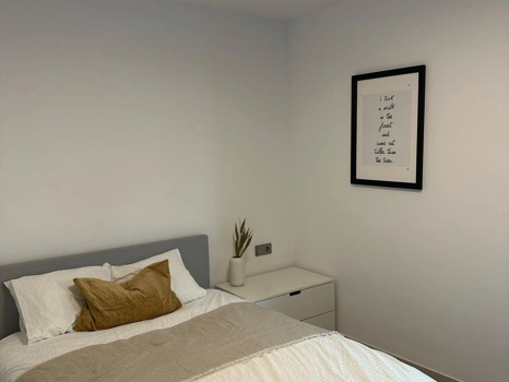 Located in the exclusive development of The Crest, this stylish 3-bedroom apartment offers a refined blend of modern design, comfort, and natural light—ideal for those seeking a spacious home on the Costa del Sol.  The open-plan living and dining area is