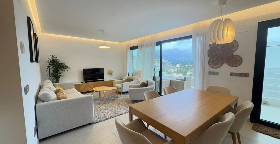 Located in the exclusive development of The Crest, this stylish 3-bedroom apartment offers a refined blend of modern design, comfort, and natural light—ideal for those seeking a spacious home on the Costa del Sol.  The open-plan living and dining area is