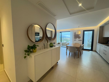 Located in the exclusive development of The Crest, this stylish 3-bedroom apartment offers a refined blend of modern design, comfort, and natural light—ideal for those seeking a spacious home on the Costa del Sol.  The open-plan living and dining area is