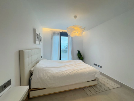 Located in the exclusive development of The Crest, this stylish 3-bedroom apartment offers a refined blend of modern design, comfort, and natural light—ideal for those seeking a spacious home on the Costa del Sol.  The open-plan living and dining area is