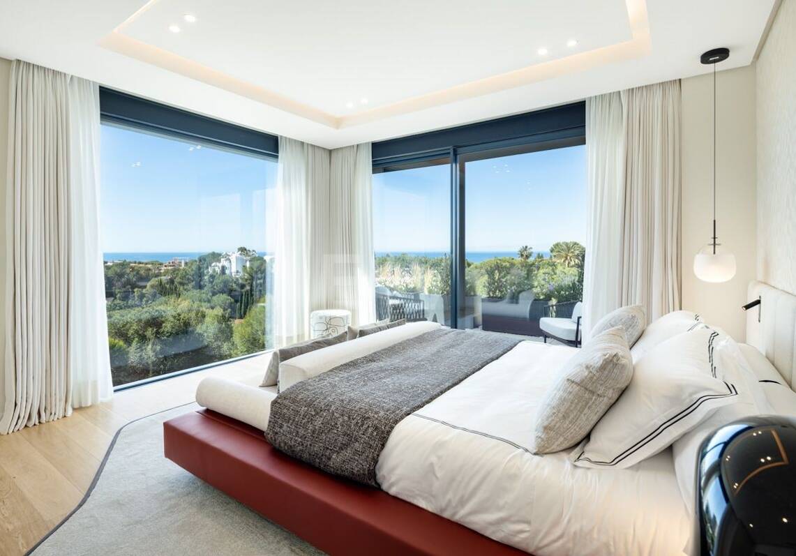 Villa design avec terrasse sur le toit offrant une vue sur la mer, espace bien-être et piscine privée à Río Real