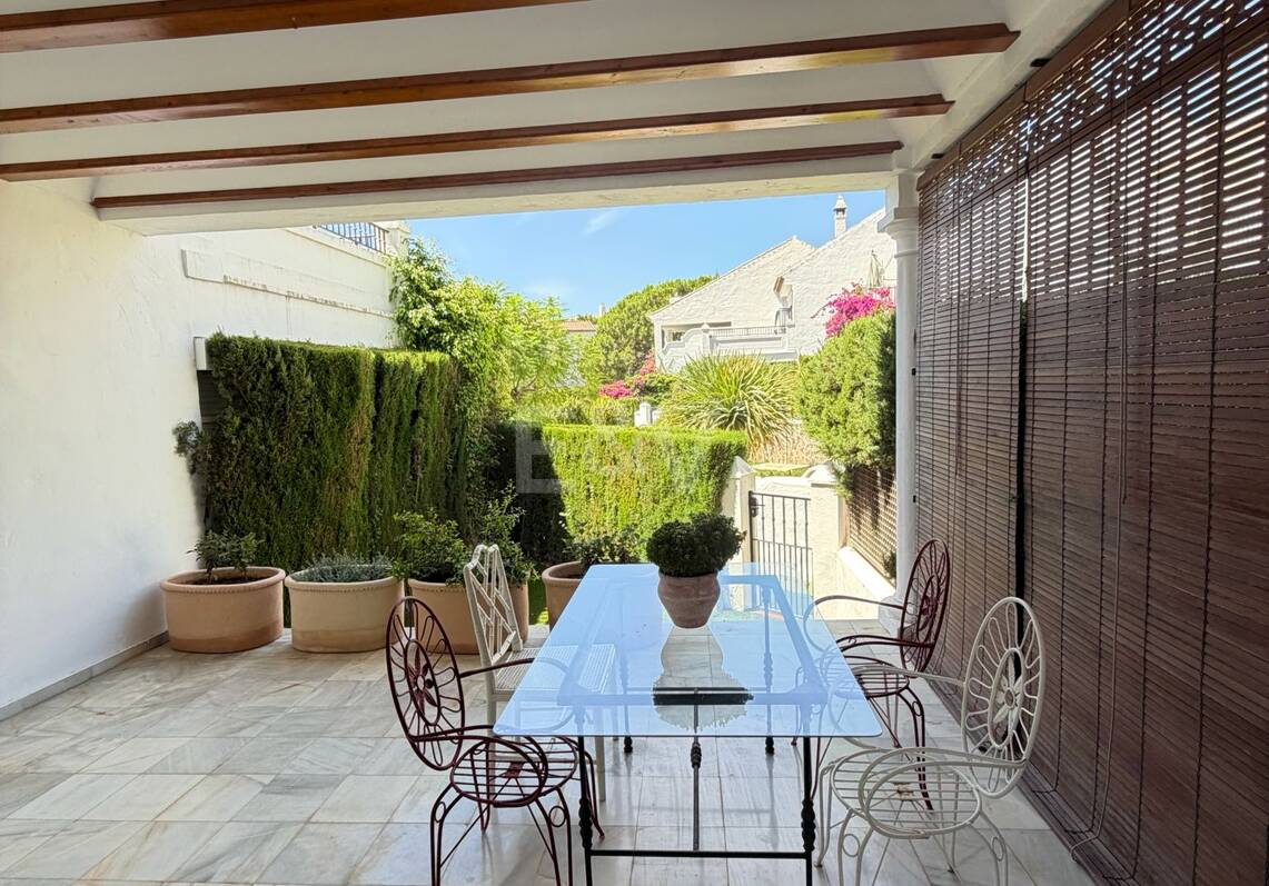 Andalusian charm in Nagüeles, Peaceful Garden Townhouse on Marbella's Golden Mile