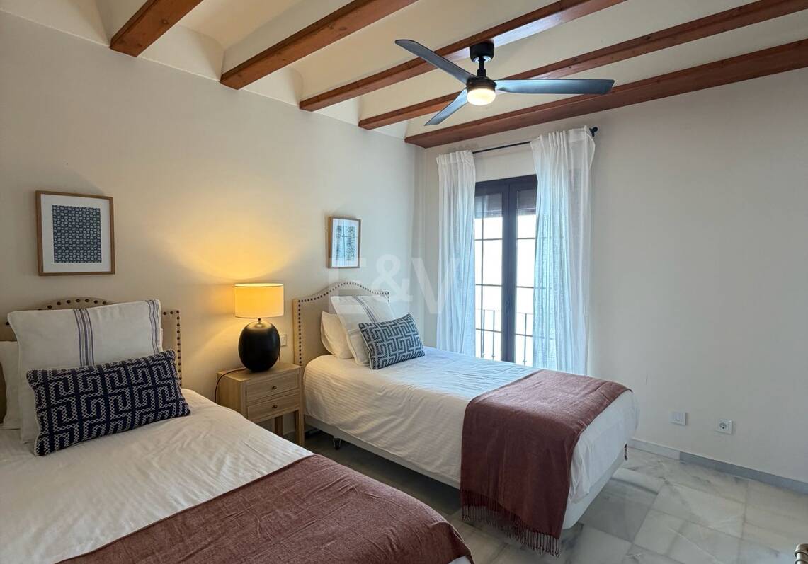 Andalusian charm in Nagüeles, Peaceful Garden Townhouse on Marbella's Golden Mile
