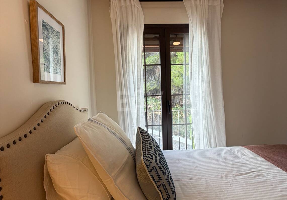 Andalusian charm in Nagüeles, Peaceful Garden Townhouse on Marbella's Golden Mile