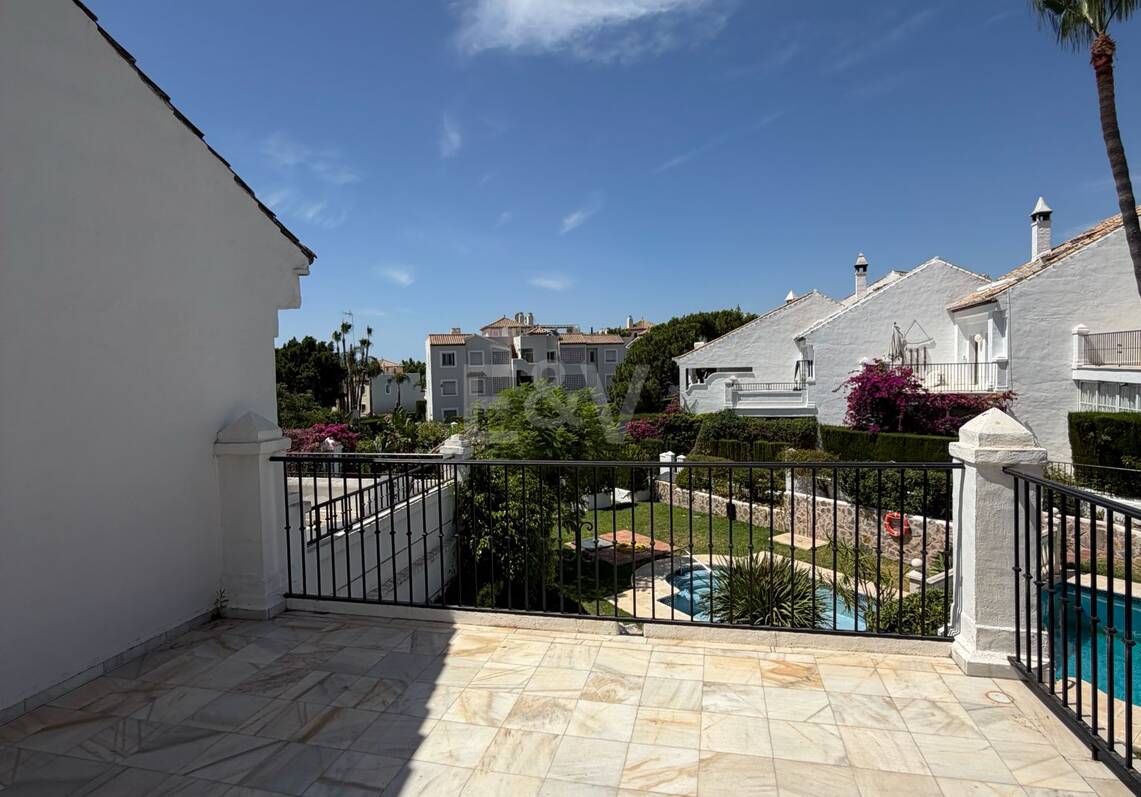 Andalusian charm in Nagüeles, Peaceful Garden Townhouse on Marbella's Golden Mile