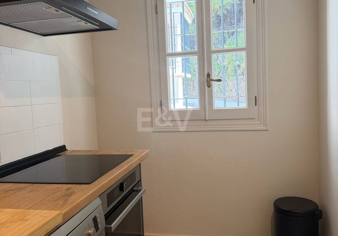 Andalusian charm in Nagüeles, Peaceful Garden Townhouse on Marbella's Golden Mile