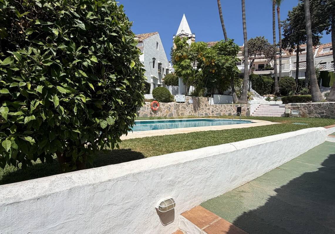 Andalusian charm in Nagüeles, Peaceful Garden Townhouse on Marbella's Golden Mile