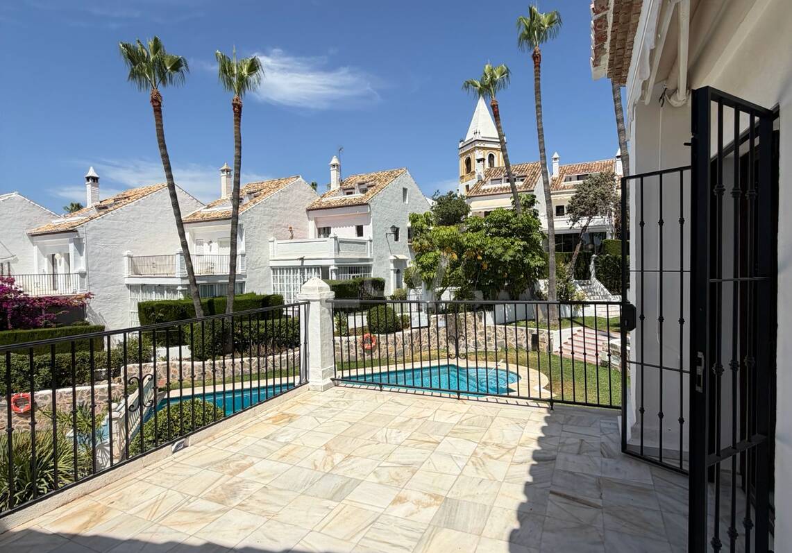 Andalusian charm in Nagüeles, Peaceful Garden Townhouse on Marbella's Golden Mile