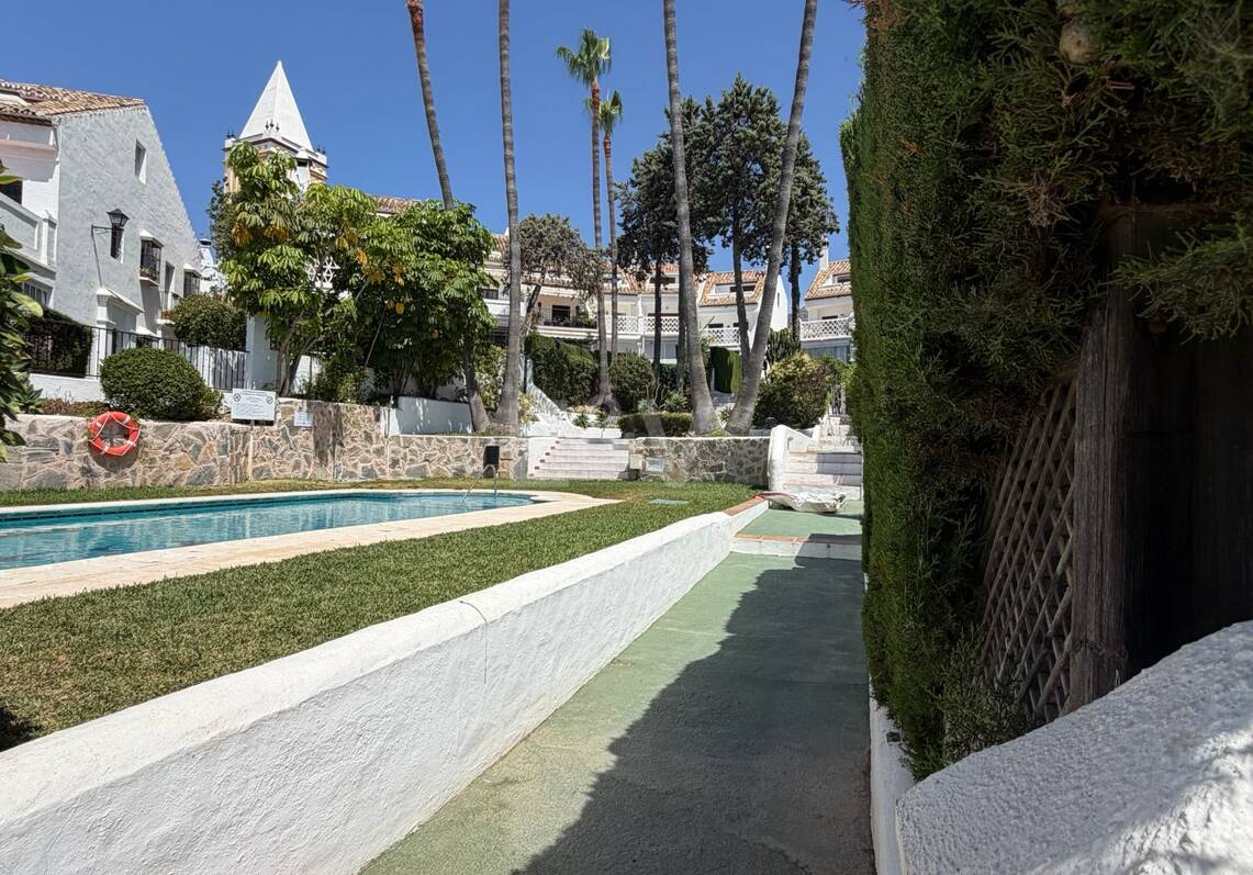Andalusian charm in Nagüeles, Peaceful Garden Townhouse on Marbella's Golden Mile