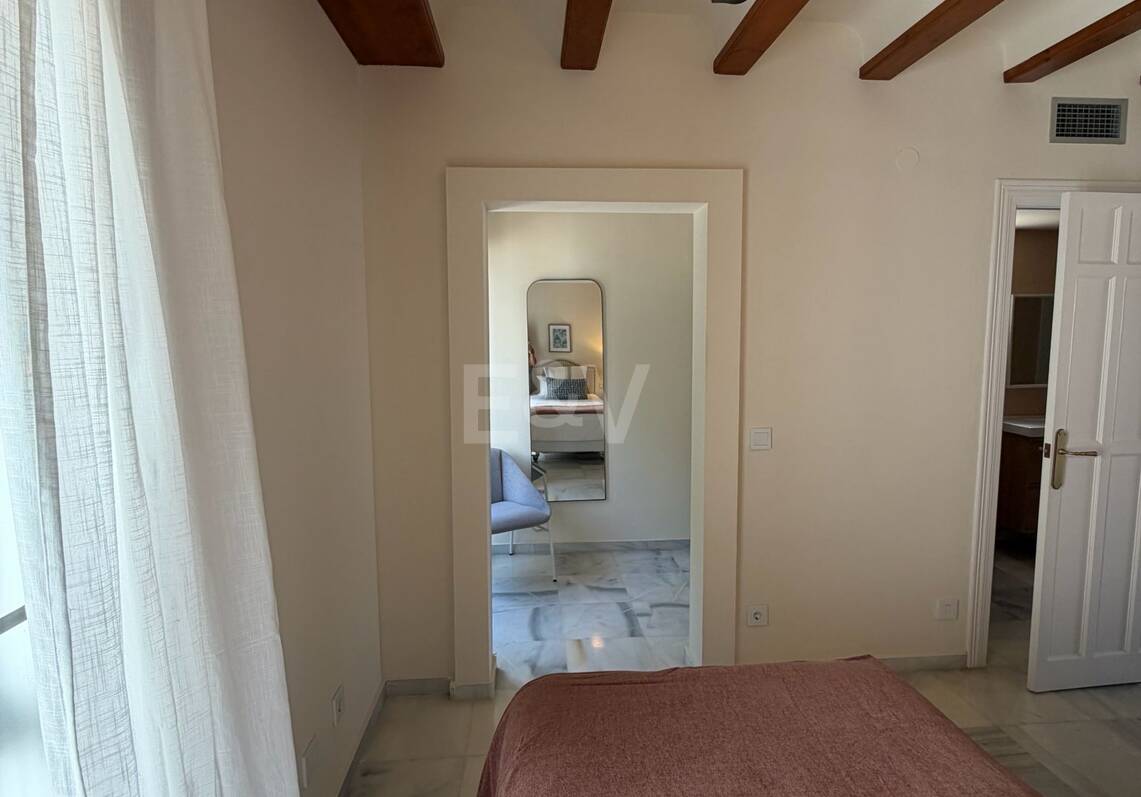 Andalusian charm in Nagüeles, Peaceful Garden Townhouse on Marbella's Golden Mile