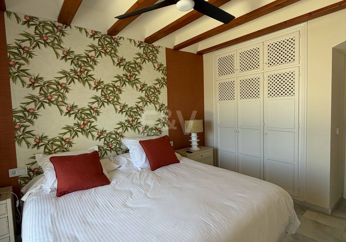 Andalusian charm in Nagüeles, Peaceful Garden Townhouse on Marbella's Golden Mile