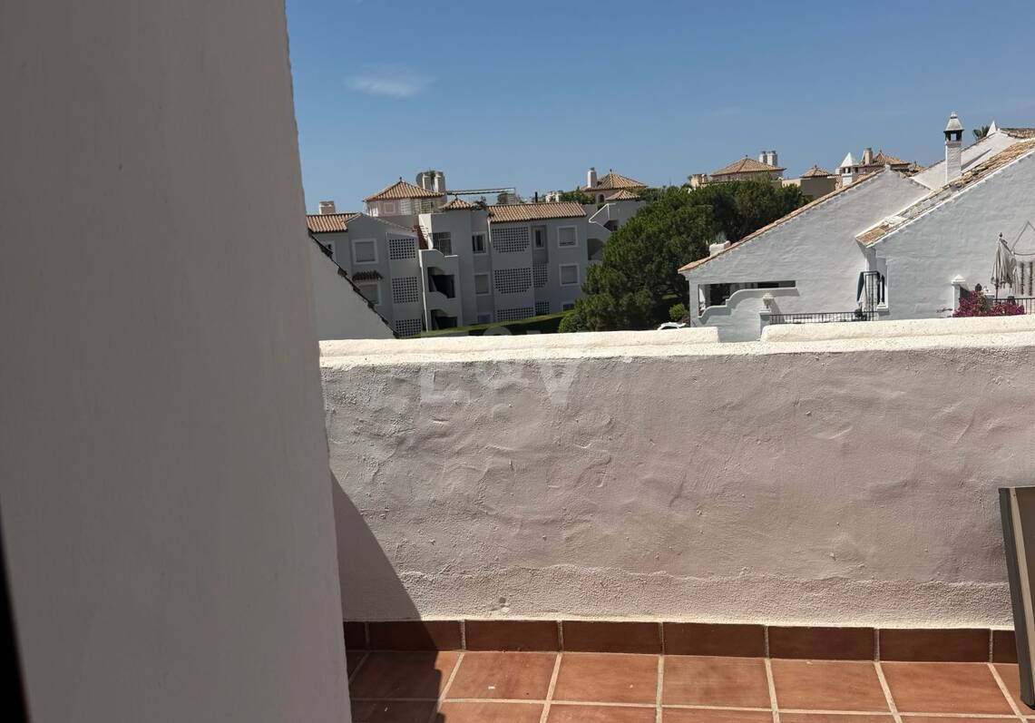 Andalusian charm in Nagüeles, Peaceful Garden Townhouse on Marbella's Golden Mile