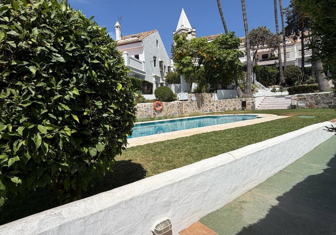 Andalusian charm in Nagüeles, Peaceful Garden Townhouse on Marbella's Golden Mile