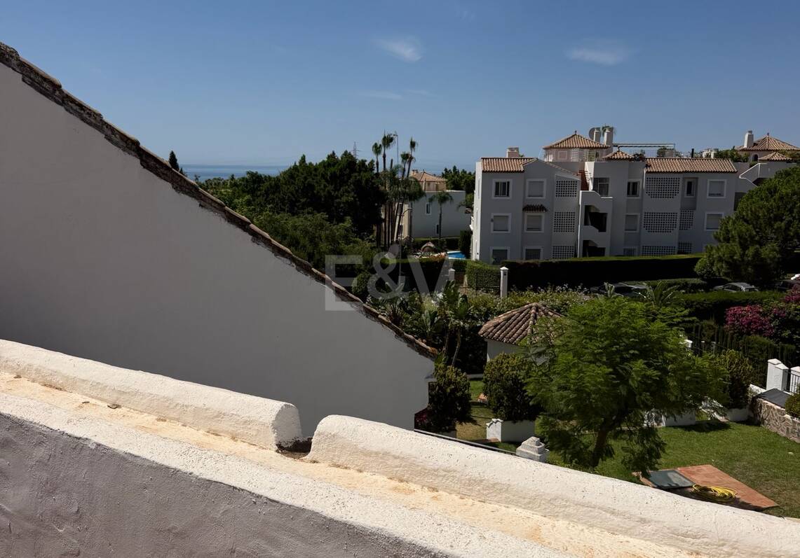 Andalusian charm in Nagüeles, Peaceful Garden Townhouse on Marbella's Golden Mile