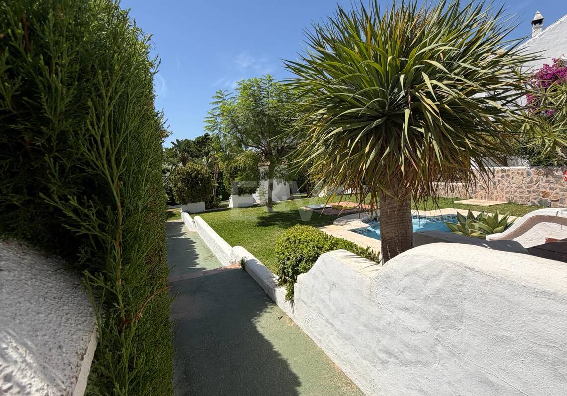Andalusian charm in Nagüeles, Peaceful Garden Townhouse on Marbella's Golden Mile
