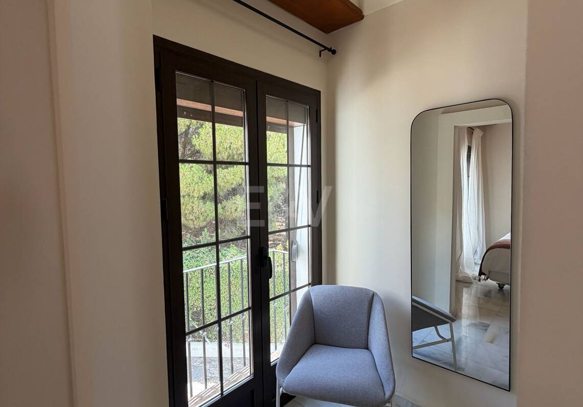 Andalusian charm in Nagüeles, Peaceful Garden Townhouse on Marbella's Golden Mile