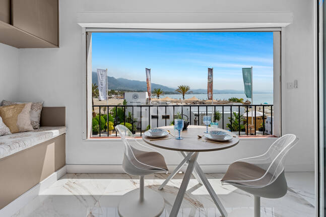 Frontline beach apartment with sea and mountain views