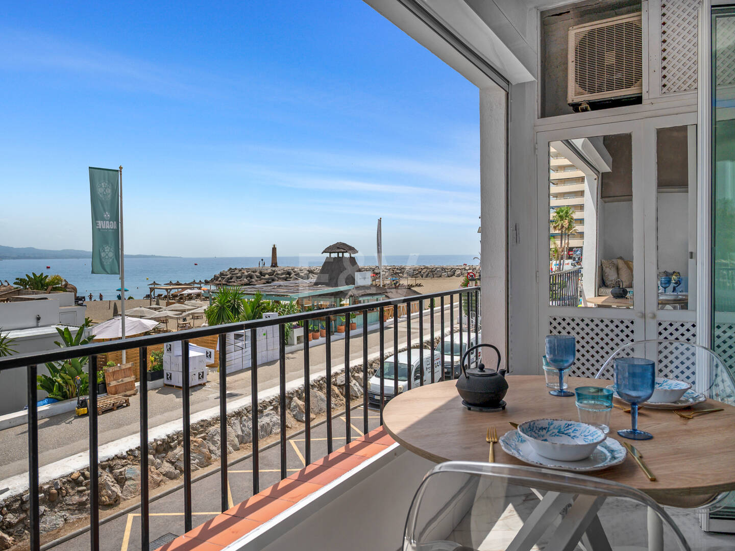 Frontline beach apartment with sea and mountain views