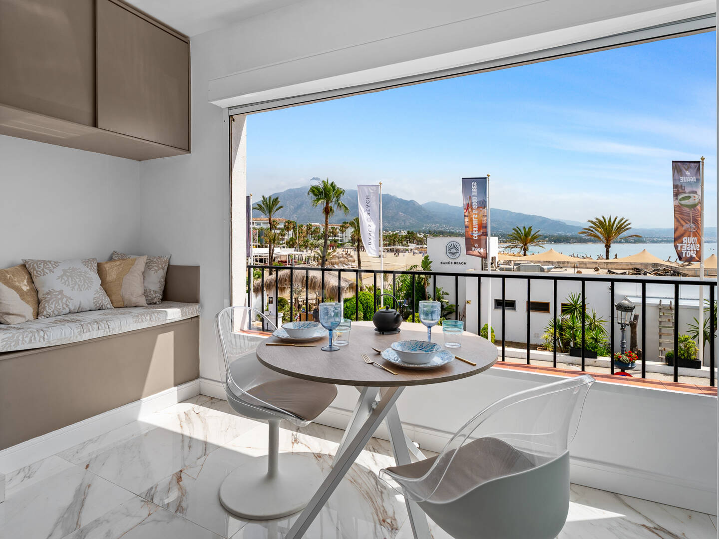Frontline beach apartment with sea and mountain views