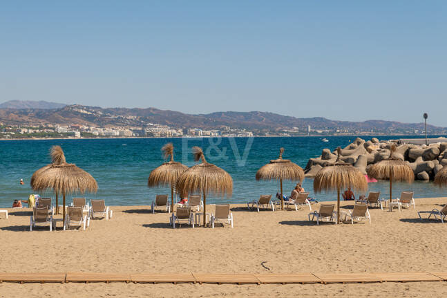 Frontline beach apartment with sea and mountain views