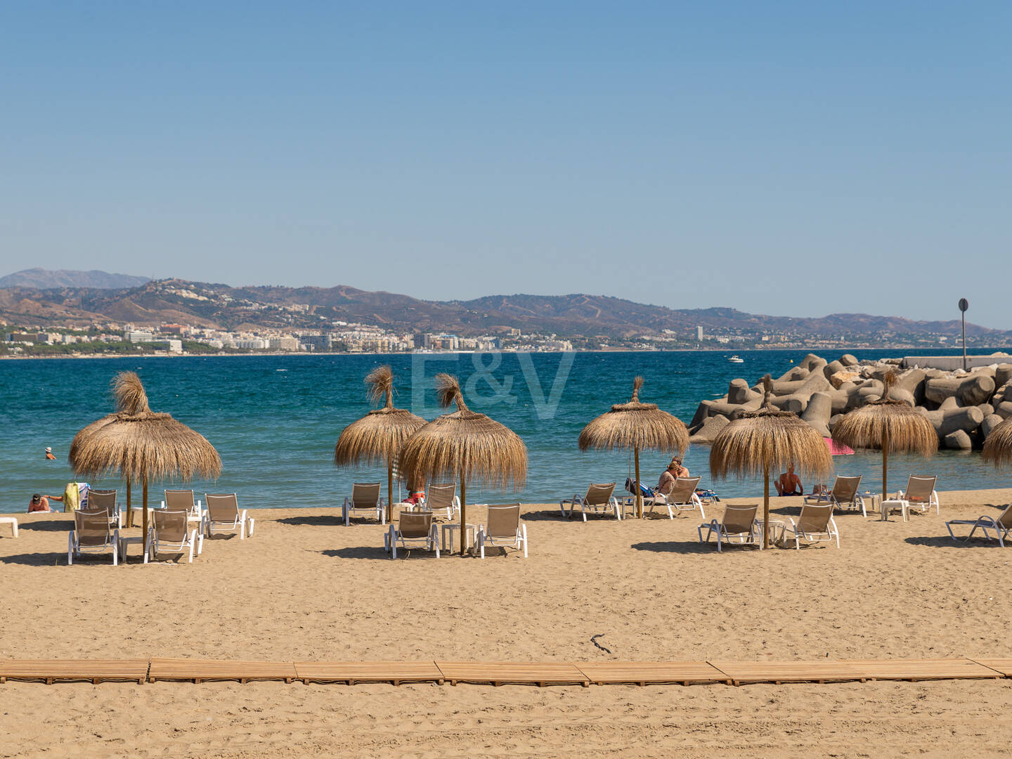 Frontline beach apartment with sea and mountain views