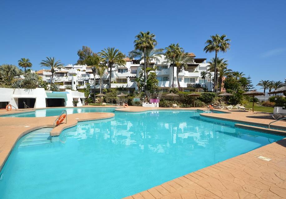 Frontline Beach Apartment with Private Garden near Puerto Banús