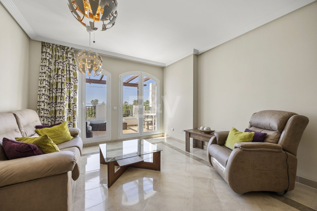 Frontline Golf Penthouse with Expansive Solarium and Sea Views