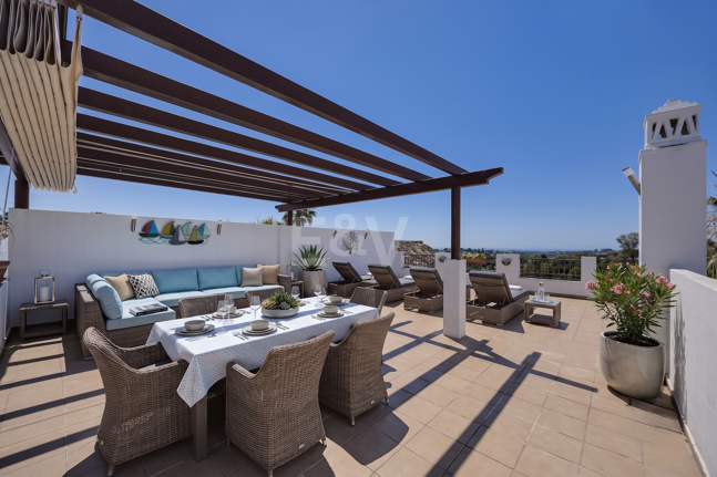 Frontline Golf Penthouse with Expansive Solarium and Sea Views