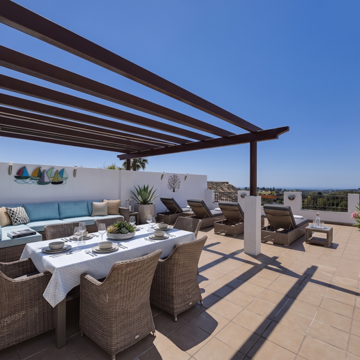 Frontline Golf Penthouse with Expansive Solarium and Sea Views