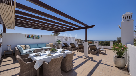 Frontline Golf Penthouse with Expansive Solarium and Sea Views