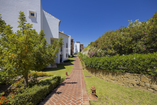 Frontline Golf Penthouse with Expansive Solarium and Sea Views