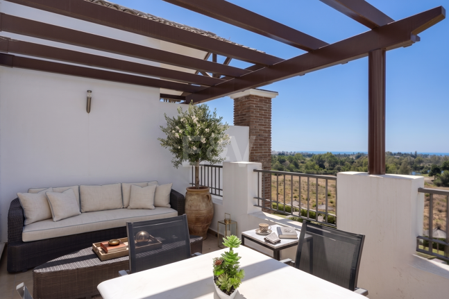 Frontline Golf Penthouse with Expansive Solarium and Sea Views