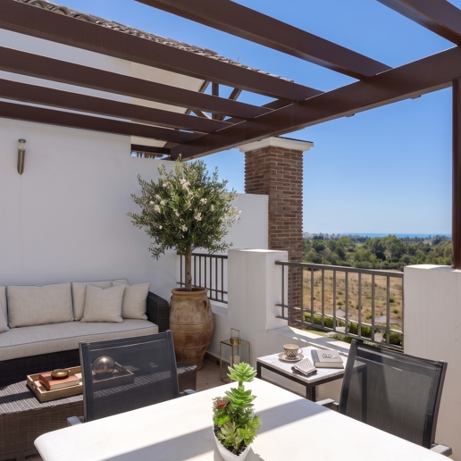 Frontline Golf Penthouse with Expansive Solarium and Sea Views